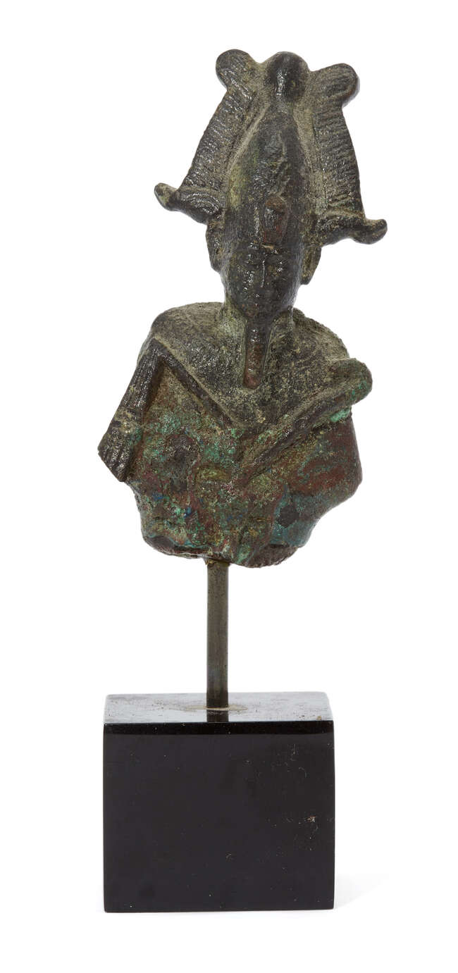 
	
		An Egyptian bronze fragmentary figure of Osiris 
		Late Period, circa 664-525 B.C
		