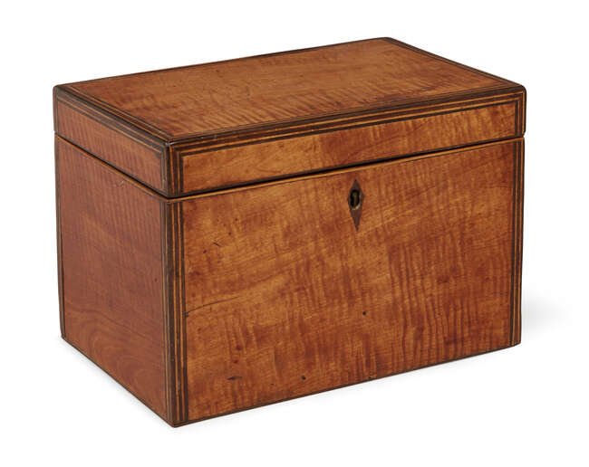 
	
		A Regency satinwood oblong two-division tea caddy, with lidded interior 19cm wide 

	

