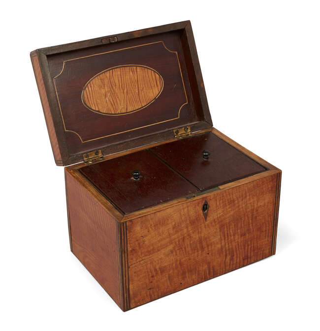 
	
		A Regency satinwood oblong two-division tea caddy, with lidded interior 19cm wide 

	

