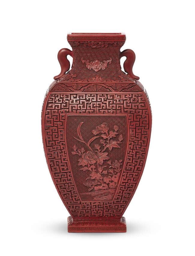 
	
		A Chinese cinnabar lacquer archaistic square vase, Qianlong period, finely carved to each...