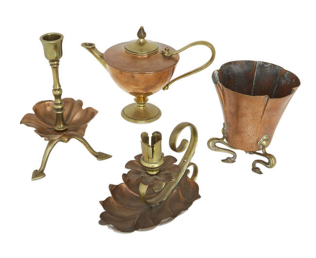 
	
		W.A.S. Benson (British 1854-1924), an Arts & Crafts copper and brass tripod candlestick,...