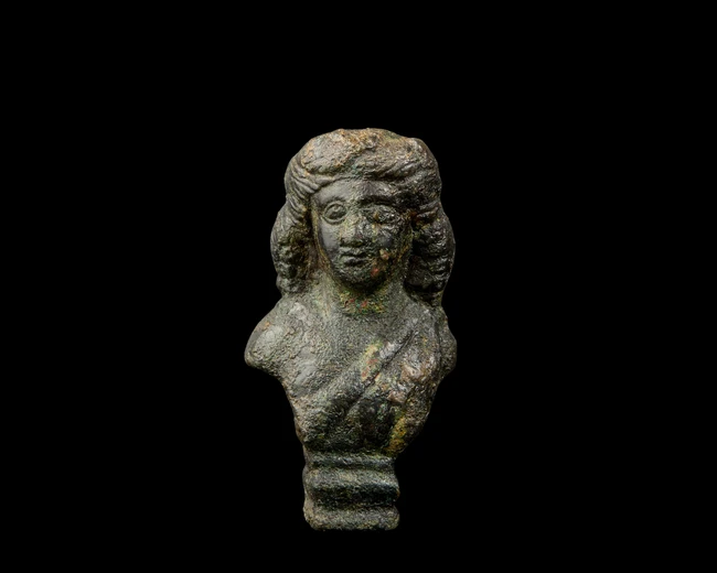 A Roman bronze stool support with the bust of a youth, Circa 2nd-3rd Century A.D.,
On a stepped...