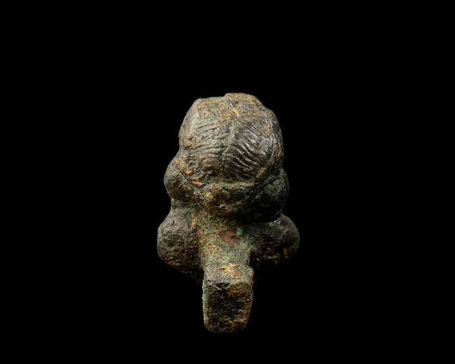 A Roman bronze stool support with the bust of a youth, Circa 2nd-3rd Century A.D.,
On a stepped...