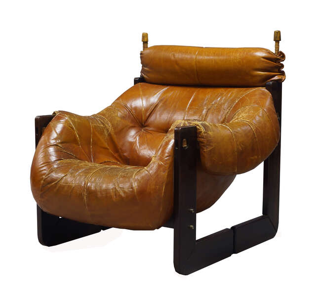 
	
		Percival Lafer (b.1936), a rosewood and leather easy chair, 
		c.1970, partial label to...