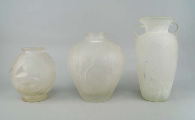 
	
		An Art Deco frosted glass globular vase, early 20th century, moulded with stylised tulip...