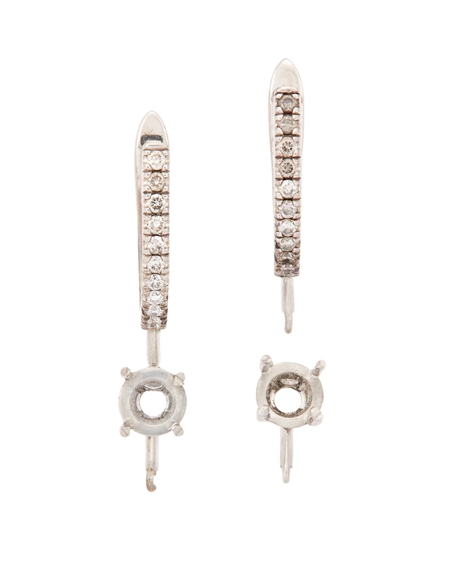 A pair of 18ct white gold diamond set earring mounts with vacant collets, designed as a...