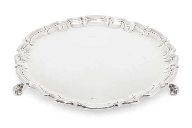 
	
		A silver salver with pie crust border, Sheffield, 1912, Joseph Rodgers & Sons, stamped...