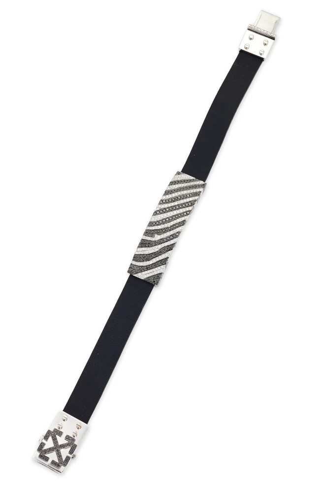 A coloured diamond set leather bracelet, composed of a central panel, with a zebra print design,...