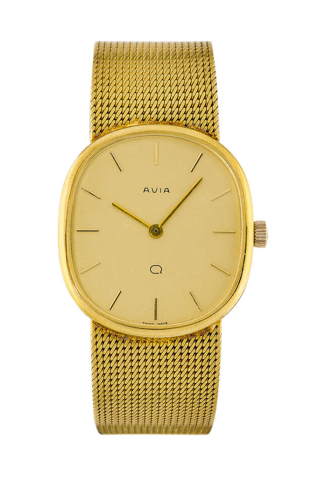
	
		A 9ct gold quartz bracelet watch, by Avia, the champagne coloured elliptical dial with...