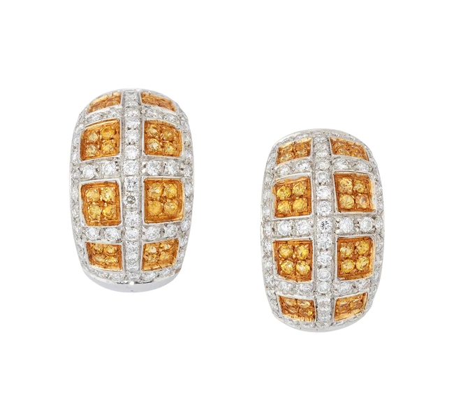 A pair of yellow sapphire and diamond half-hoop earrings, designed as pavé yellow sapphire set...