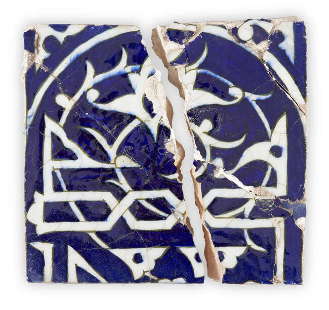 
	
		An Ilkhanid cobalt blue glazed Kufic pottery inscription tile, Iran, 14th century or...