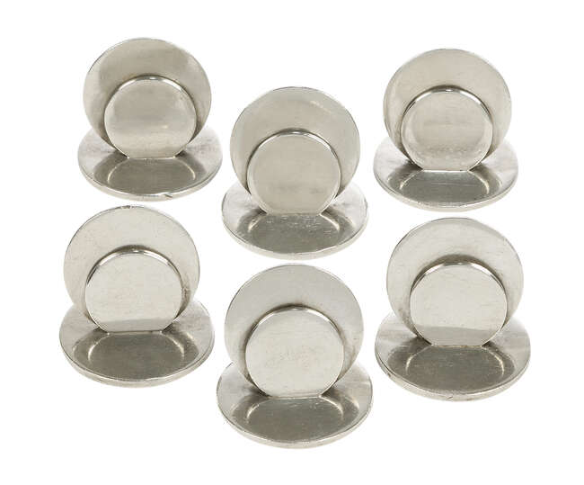 
	
		A Set of six silver menu/place holders 
		Mark of Sampson Mordan & Co Ltd, Chester...