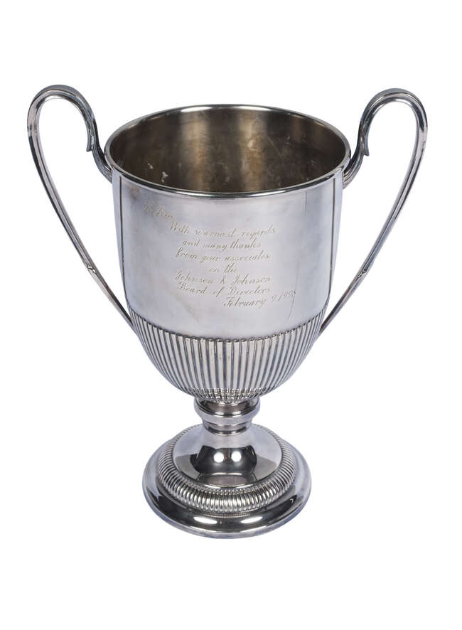 
	
		Cartier: A large Cartier Sterling silver twin handled trophy cup, c.1998 with engraved...