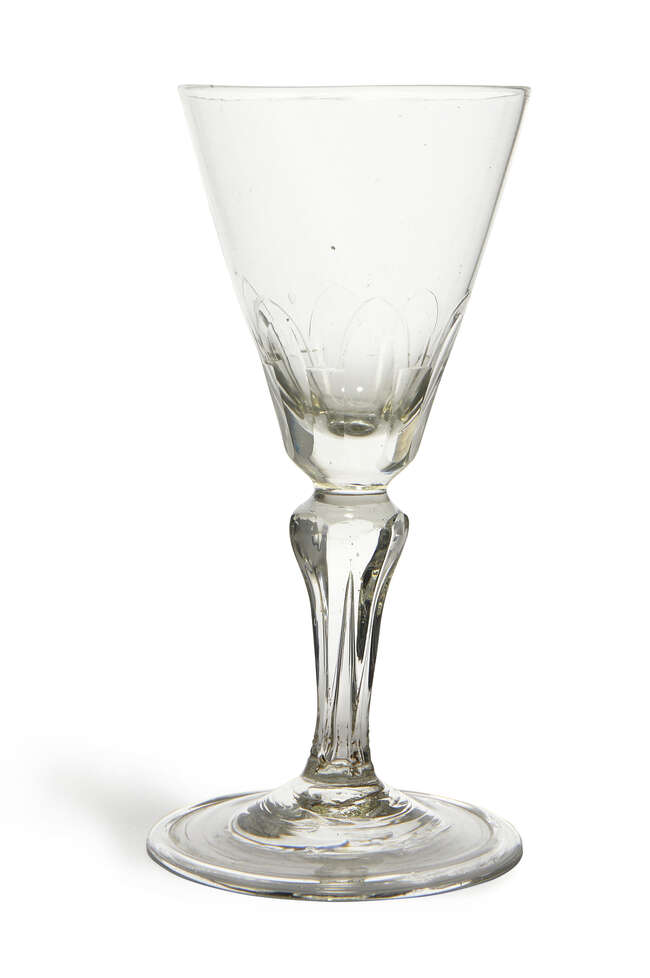
	
		A George I wine glass, with  inverted conical bowl leading to an inverted lappet and...