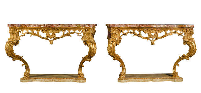 
	
		A pair of George III style carved giltwood console tables, each with the Sicilian jasper...
