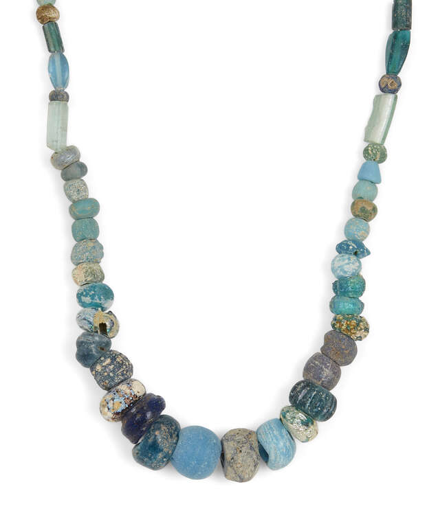 
	
		Seven strings of hardstone, glass, calcite and glazed faience beads
		Circa 1st...