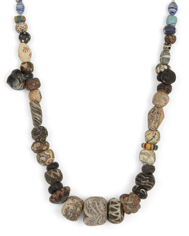 
	
		Seven strings of hardstone, glass, calcite and glazed faience beads
		Circa 1st...