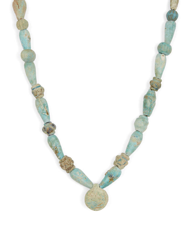 
	
		Seven strings of hardstone, glass, calcite and glazed faience beads
		Circa 1st...