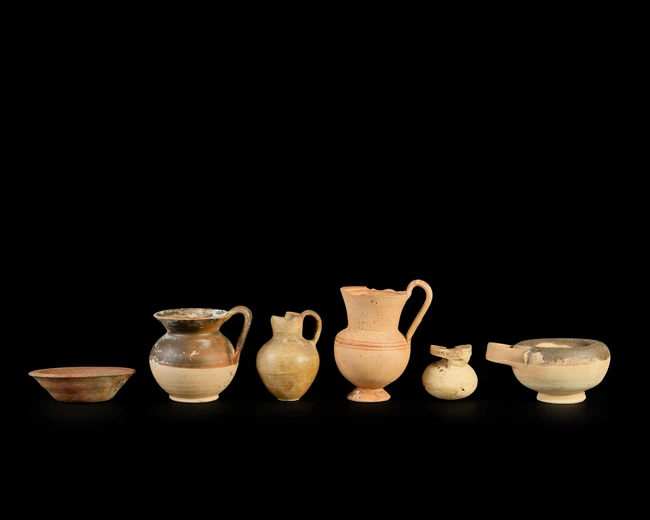 Six ancient pottery vessels, circa 7th-2nd Century B.C., including a fragmentary Corinthian...