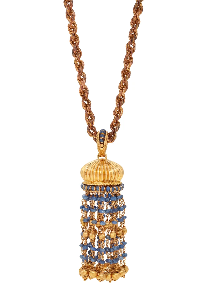 A sapphire tassel necklace, the pendant composed of faceted sapphire bead set tassels, to a...