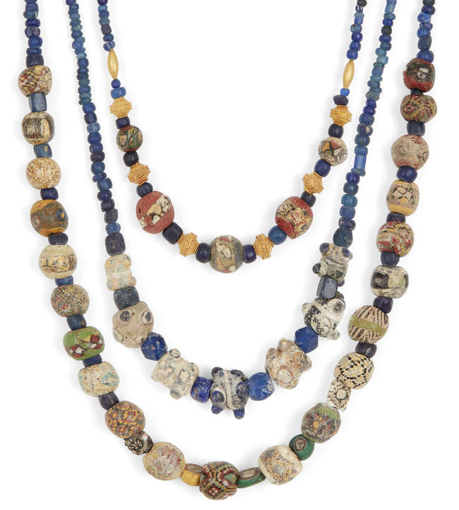 
	
		Two mostly Roman mosaic glass bead necklaces and an eye bead necklace
		1st Century...