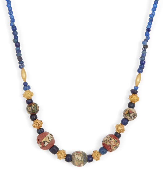 
	
		Two mostly Roman mosaic glass bead necklaces and an eye bead necklace
		1st Century...