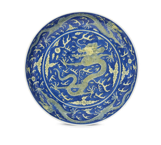 
	
		A Chinese porcelain &#39;dragon&#39; dish, Daoguang seal mark and period, finely enamelled in...