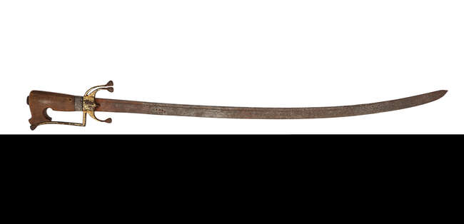 
	
		A Nimcha sword with rhino horn hilt, North Africa, probably Morocco, late 18th-early 19th...