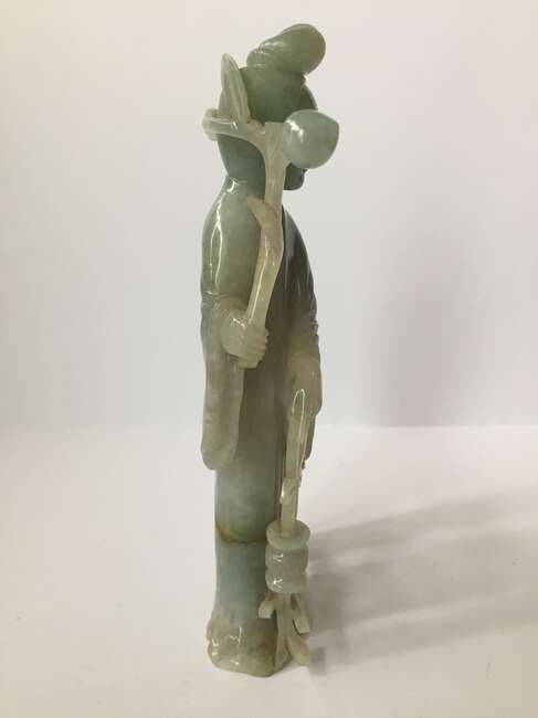 
	
		A Chinese jadeite figure of a woman and child, early 20th century, carved standing, each...