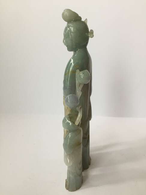 
	
		A Chinese jadeite figure of a woman and child, early 20th century, carved standing, each...