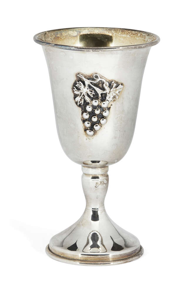 
	
		A modern Israeli silver Kiddush cup, stamped ST925, decorated with applied fruiting vine...