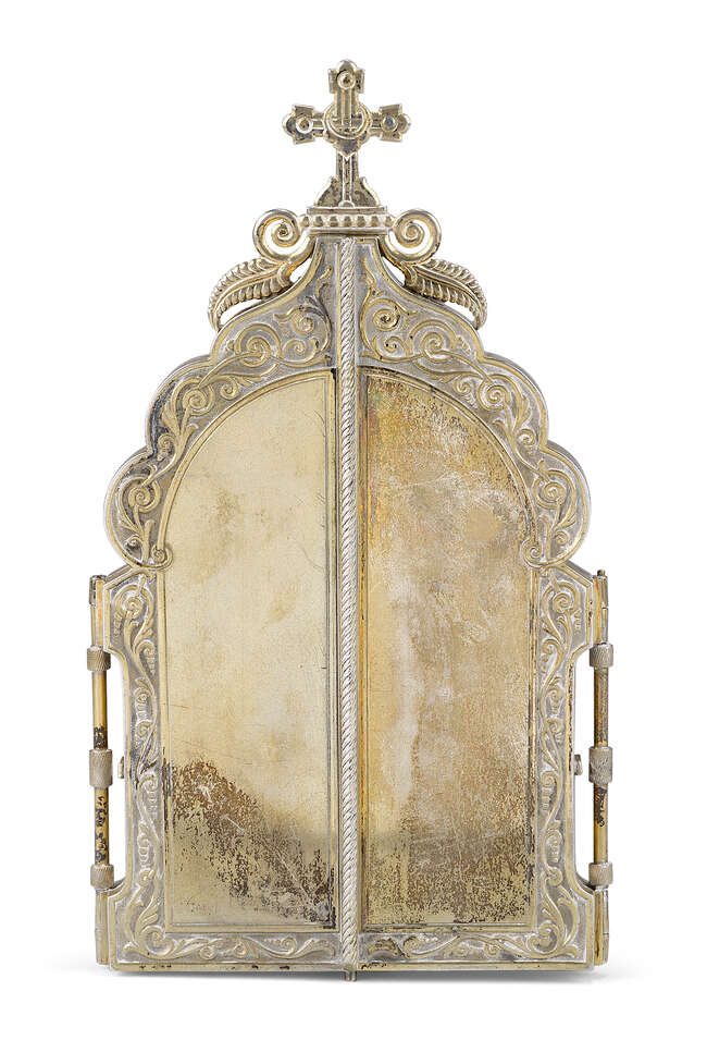 A Russian silver-gilt travelling triptych icon, by Ivan Khlebnikov, Moscow, 1899-1908, assay...