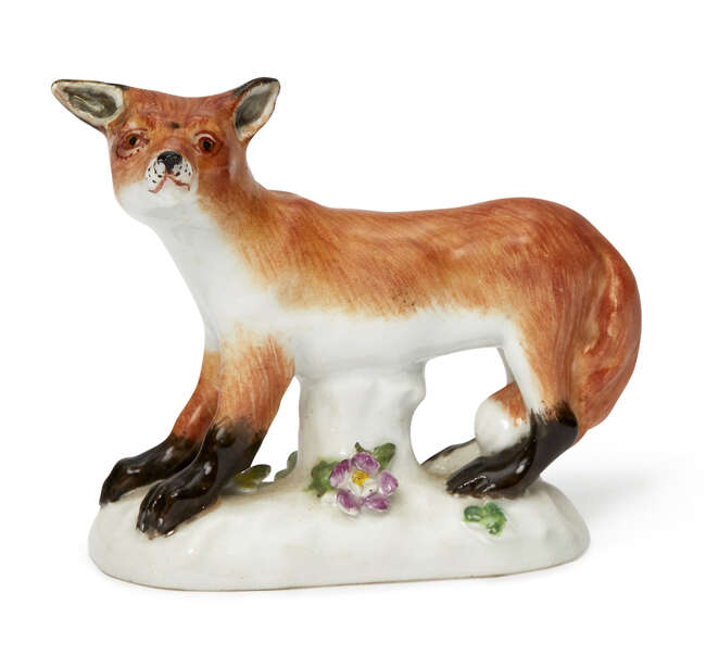 
	
		A Meissen porcelain model of a fox, circa 1955, blue crossed swords mark and incised...