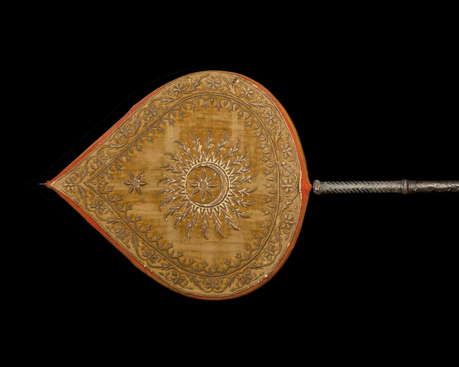 An embroidered yellow and purple velvet drop shaped fan, Mewar, Rajasthan, North India, 19th...