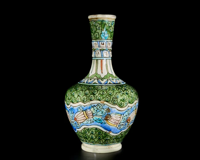 A pottery ewer, Possibly Kutahaya, 20th century, 
On short foot, the globular body rising to...