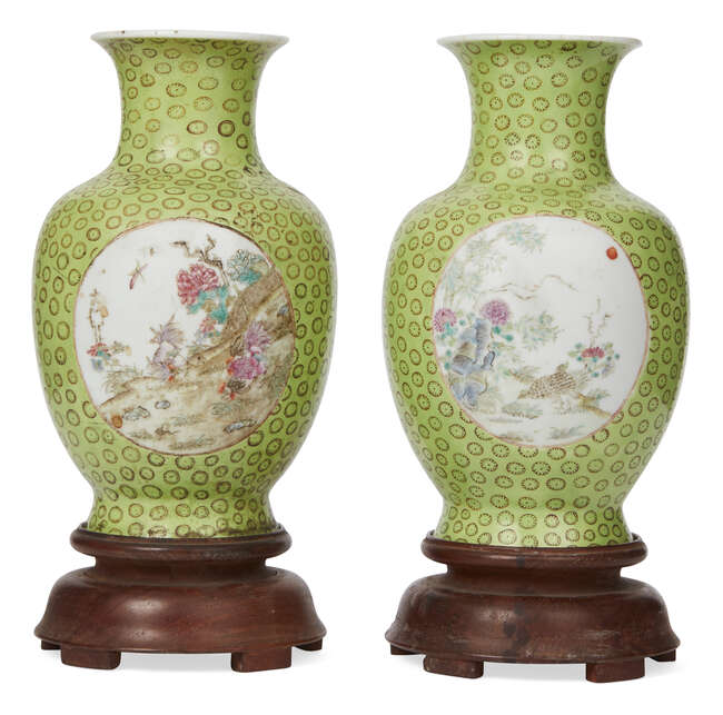 
	
		A pair of Chinese porcelain vases, Tongzhi period, painted in famille rose enamels to two...