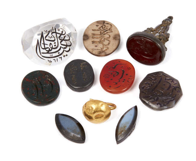 
	
		A group of carved personal seals comprising a cut rock crystal seal inscribed with the...