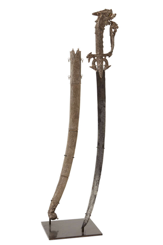 
	
		A gem-set silver and gold Singhalese steel sword (kastane) and scabbard, Sri Lanka, 17th...