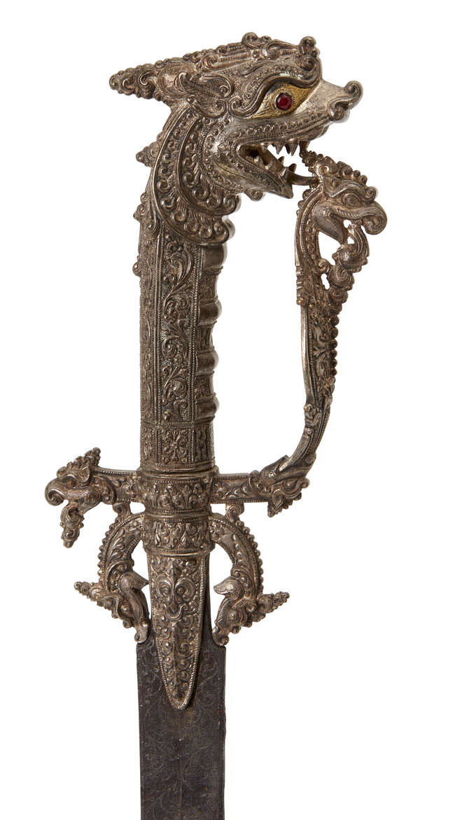 
	
		A gem-set silver and gold Singhalese steel sword (kastane) and scabbard, Sri Lanka, 17th...