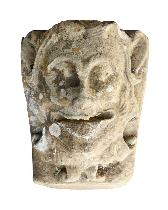 
	
		A carved stone grotesque mask keystone, c.1850, 56cm high, 31cm wide, 34cm deep

	

