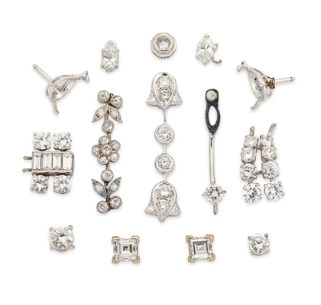 A group of diamond set components, including: a brilliant-cut diamond collet approximate weight...