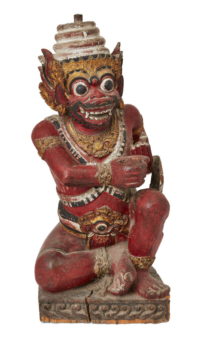 
	
		A Balinese polychrome wood carving of a temple guardian, early 20th century, modelled...