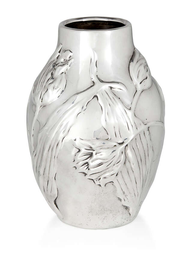 
	
		Tiffany & Co,  
		 
		Sterling repousse work vase with tulip decoration, late 20th...