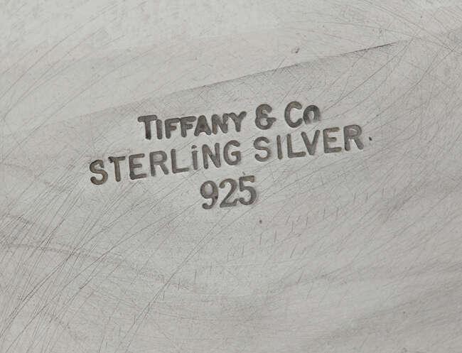 
	
		Tiffany & Co,  
		 
		Sterling repousse work vase with tulip decoration, late 20th...