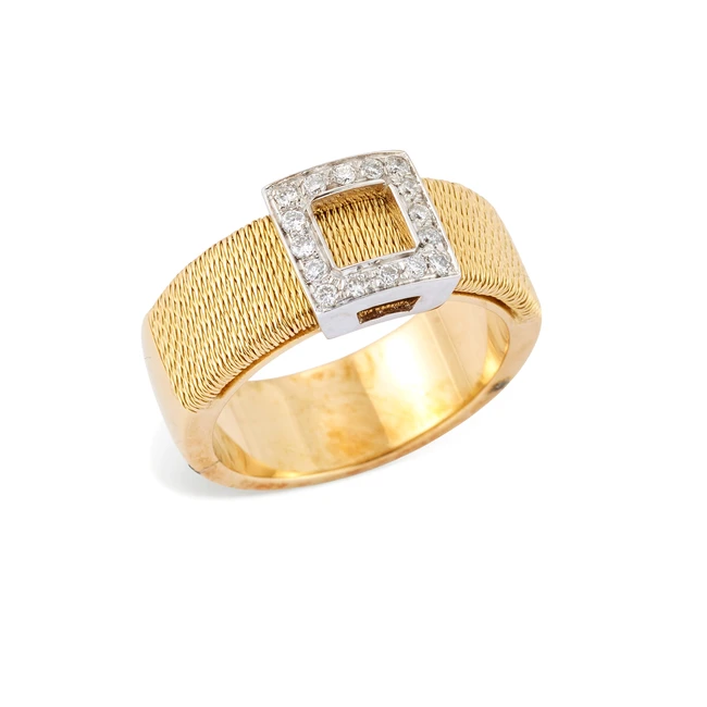 A diamond set ring, composed of an open rectangular plaque, set with brilliant-cut diamonds, the...