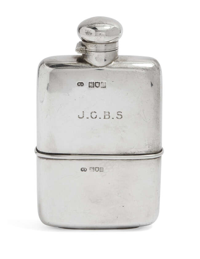 
	
		An Edwardian silver hip flask, London, c.1906, Atkin Brothers, with detachable drinking...