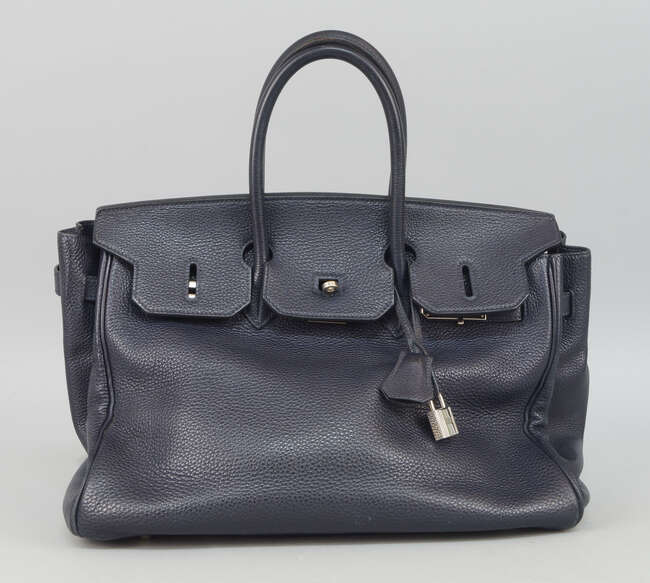 
	
		Hermes: an Hermes Birkin Retourne handbag, in navy blue Togo leather, blind stamp D for...
