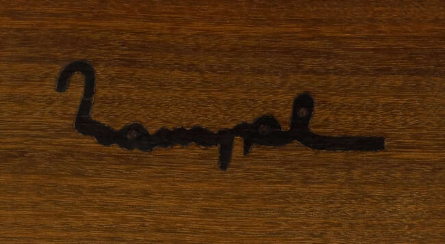 
	
		Marc Van Rampelberg (b.1949), an Iroko writing desk and stool  
		c.1986, with inlaid...