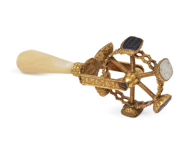 
	
		A Victorian gilt metal revolving desk seal, the seals of rectangular form, of agate,...