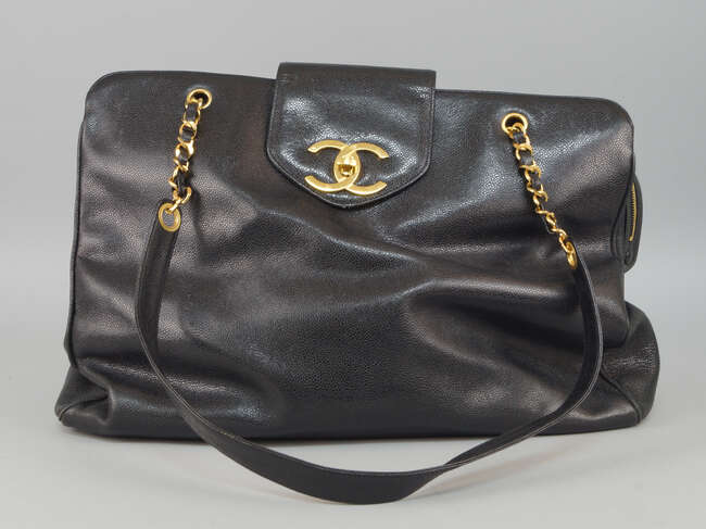 
	
		Chanel: a black caviar leather Supermodel XL shoulder tote bag, number 4474589, with cart...